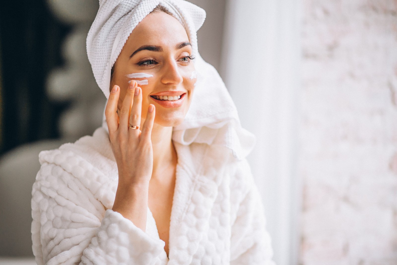 Women applying lotion